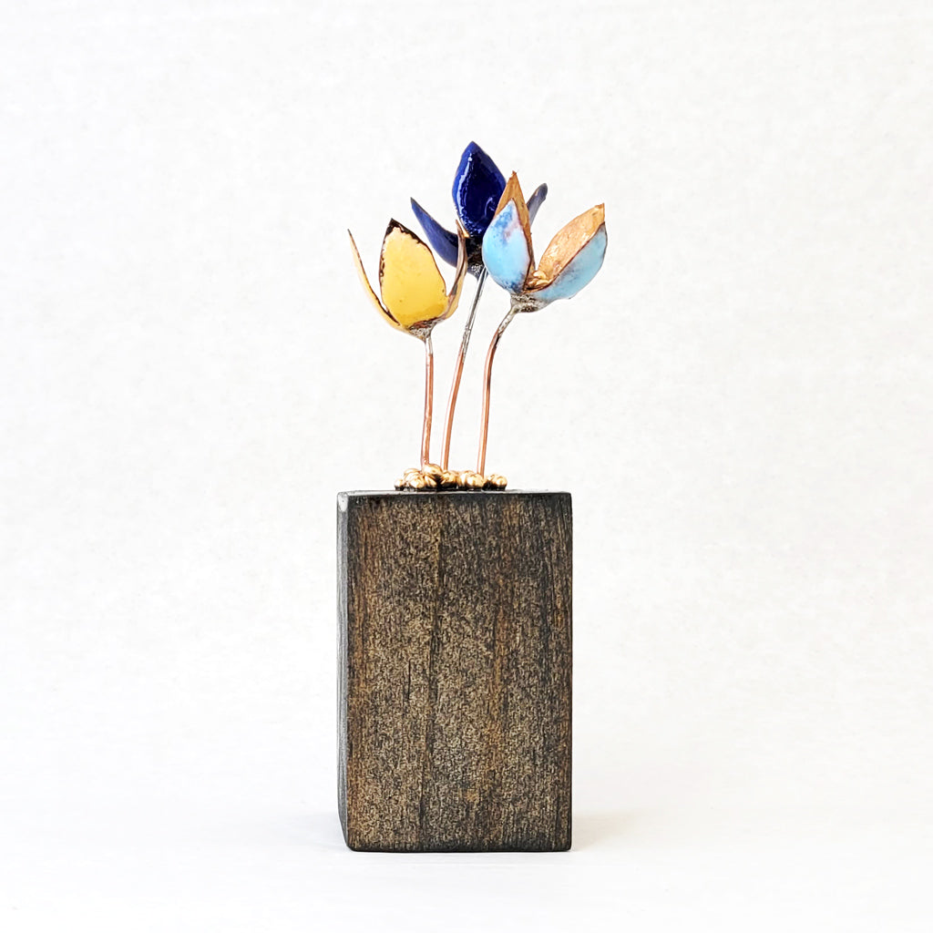 Mini flower bouquet made from enamel on copper.