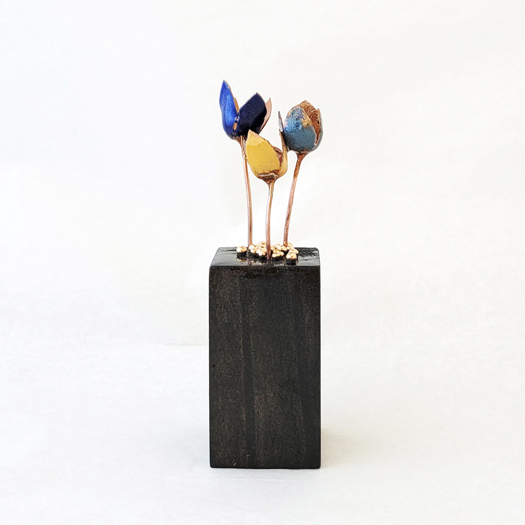 Mini flower bouquet made from enamel on copper.