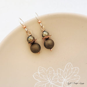 Handmade earring of copper circle flower petal nestled between an army green/gold druzy and faceted agate.