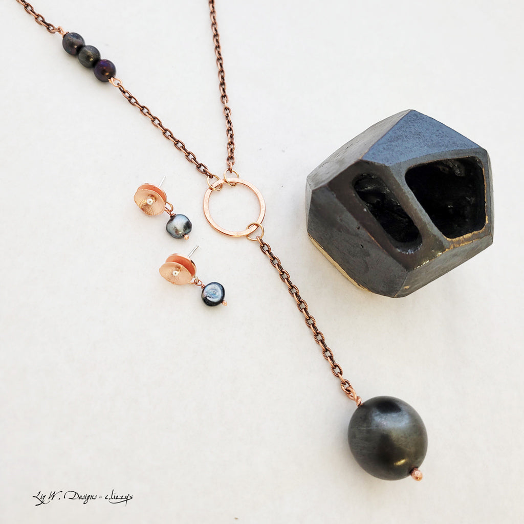 Handmade necklace with charcoal patina copper beads.