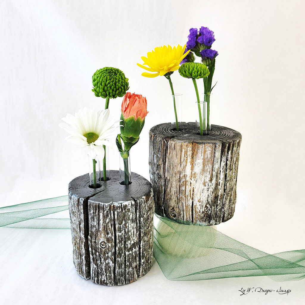 Three bud vase on found weathered wood with light white wash.