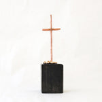 Mini hand-fabricated copper cross with texture on found wood.