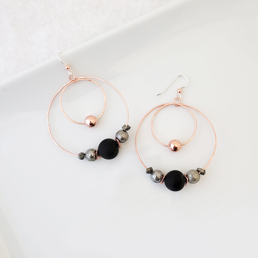 Handmade earrings large size.  Hand-fabricated copper circles that are lightweight, featuring copper beads, pyrite and agates