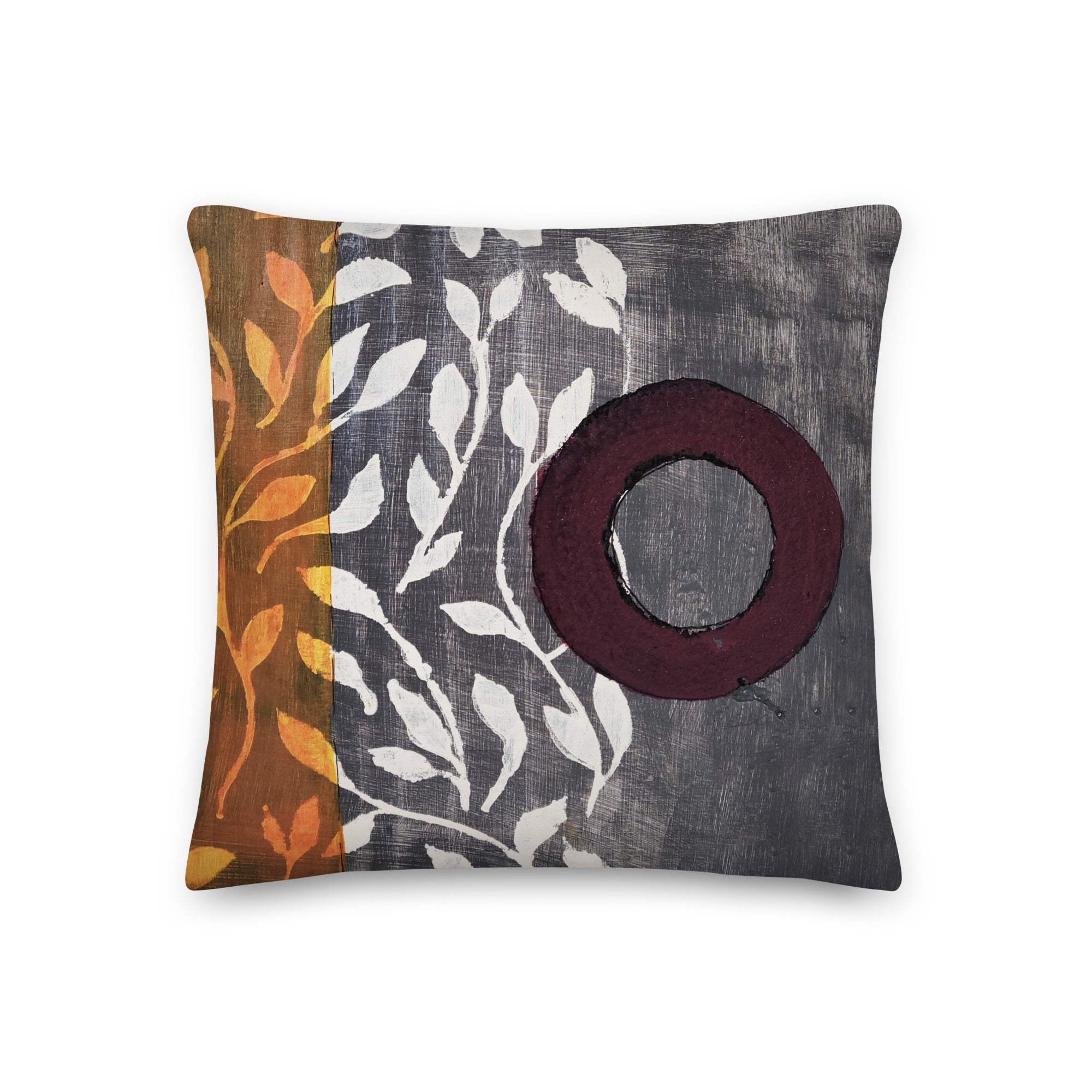 Pillow of original art. Plum circle on gray and light burnt orange background with off-white leaf design.