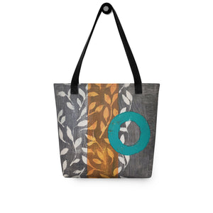 Tote bag of original art.  Turquoise circle on gray and light burnt orange background with off-white leaf design.