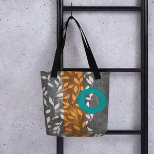 Tote bag of original art.  Turquoise circle on gray and light burnt orange background with off-white leaf design.