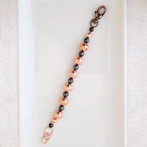 Handmade bracelet with copper beads, both regular copper and dark patina copper for contrast
