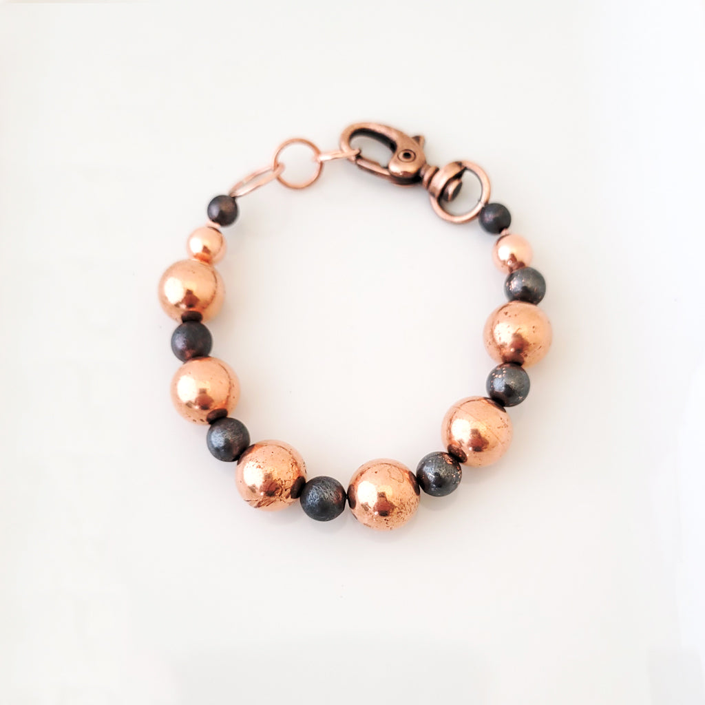 Handmade bracelet with copper beads, both regular copper and dark patina copper for contrast